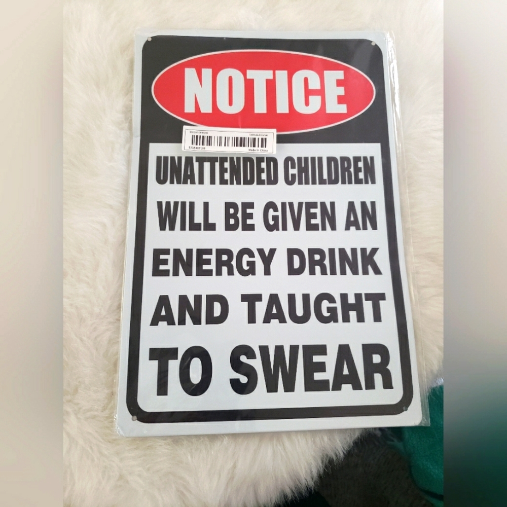 NWT Tin Sign